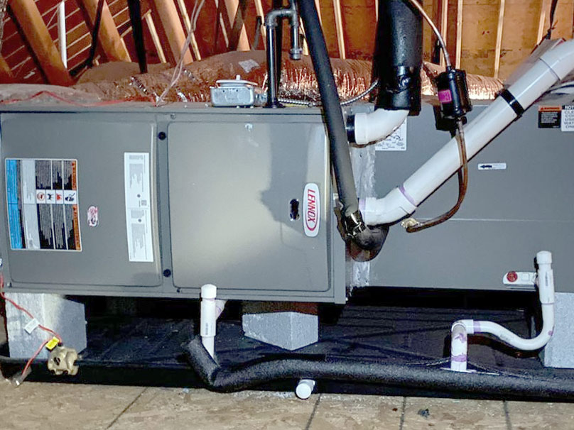 Men looking at a new furnace installation