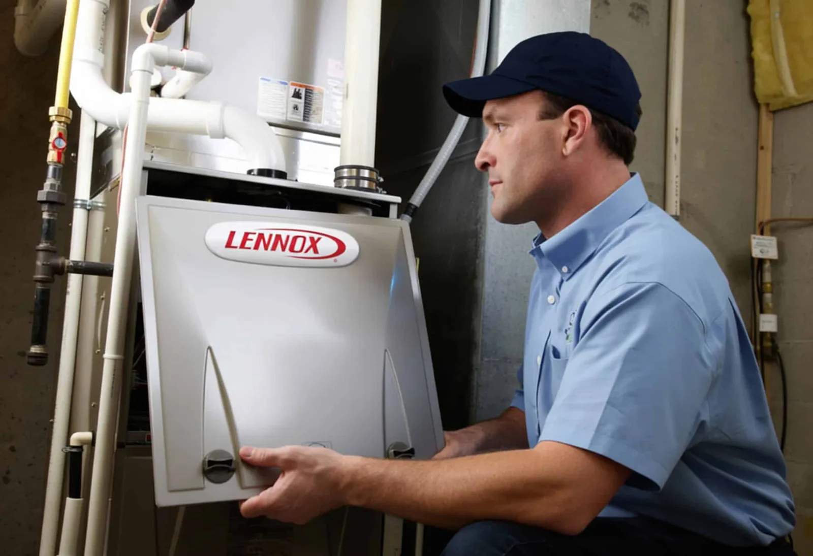HVAC technician servicing a Lennox system