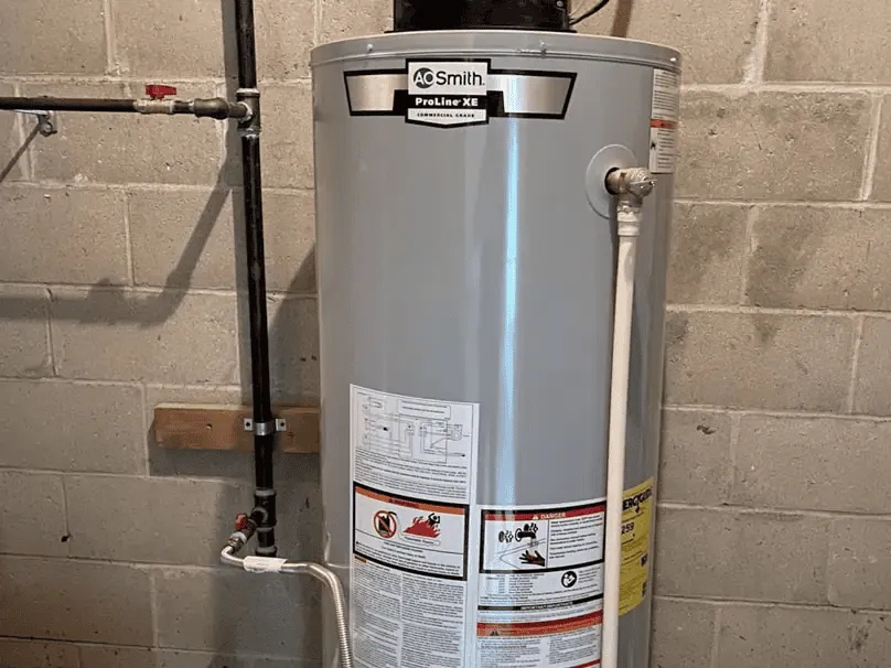 Installed tank water heater ready for replacement service.