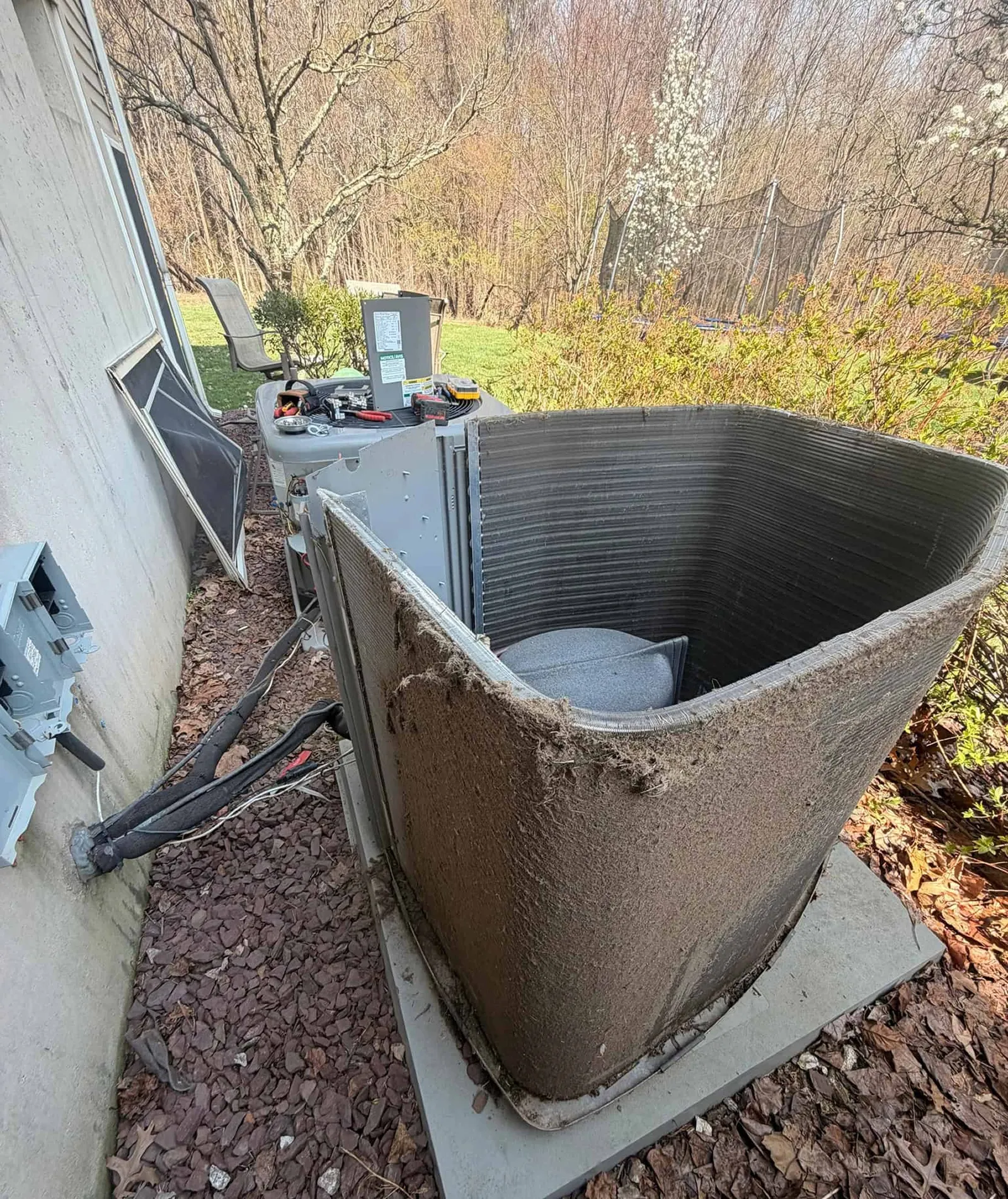Dirty AC condenser coil before cleaning.