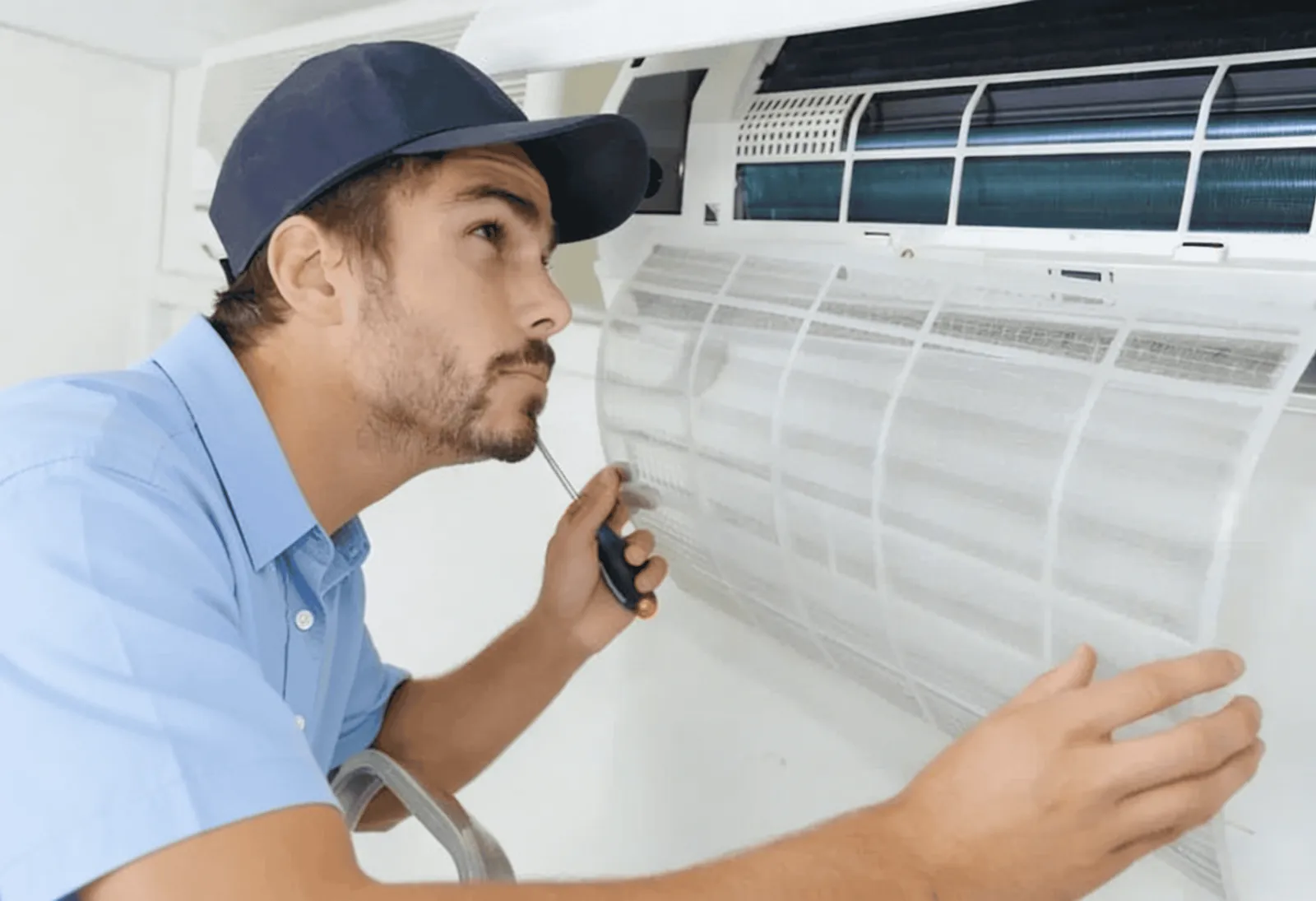 Technician inspecting a home HVAC filter.